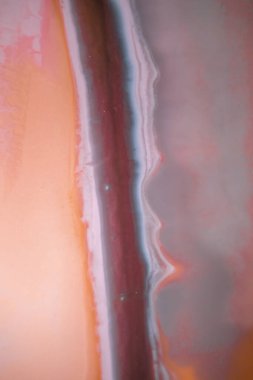 Renkli soyut epoksi reçine resminin makro fotoğrafı. Tasarım kapağı, yıllık rapor, davetiye, el ilanı, sunum, ambalaj, poster, kartvizit, düğün davetiyesi için başvurulabilir. Modern sancak için modern sıvı sanat, ruhani grafik tasarım.