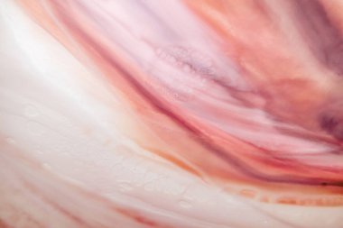 Renkli soyut epoksi reçine resminin makro fotoğrafı. Tasarım kapağı, yıllık rapor, davetiye, el ilanı, sunum, ambalaj, poster, kartvizit, düğün davetiyesi için başvurulabilir. Modern sancak için modern sıvı sanat, ruhani grafik tasarım.