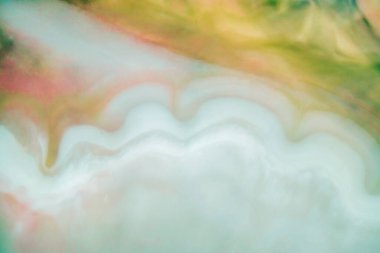 Renkli soyut epoksi reçine resminin makro fotoğrafı. Tasarım kapağı, yıllık rapor, davetiye, el ilanı, sunum, ambalaj, poster, kartvizit, düğün davetiyesi için başvurulabilir. Modern sancak için modern sıvı sanat, ruhani grafik tasarım.