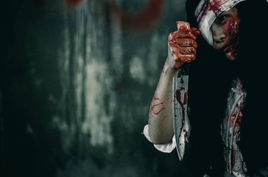 Korkunç Kadın Sahnesi, Cadılar Bayramı Cinayet Konsepti.