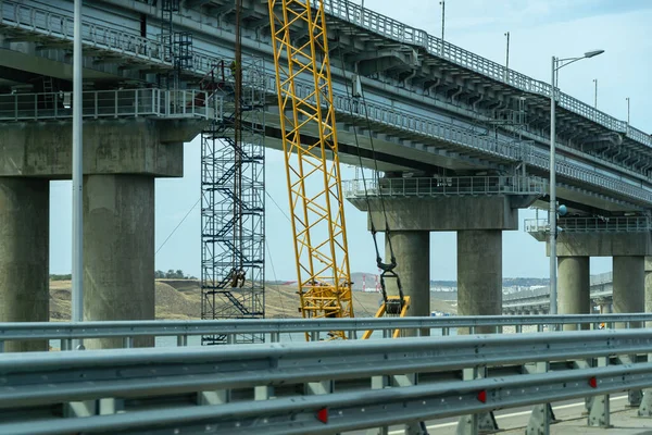 New Crimean bridge connecting Taman and Kerch. Railway bridge rises above automobile.