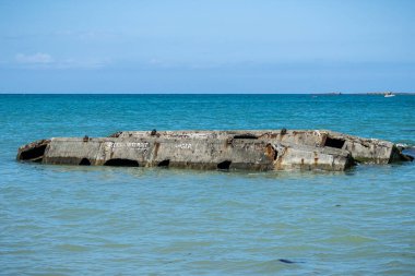 Dünya Savaşı iki d-day Mulberry limanı denizdeki beton bloklar, Arromanches-les-Bains, Normandiya, Fransa.