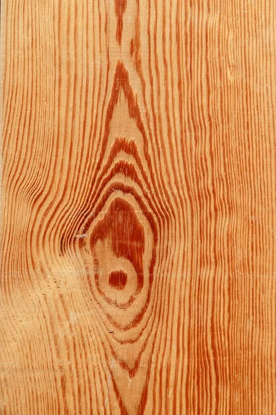 Antiguo fondo arañado de madera con un nudo . —  Fotos de Stock