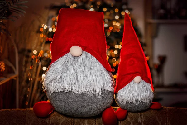 Christmas gnome on the background of Christmas lights — Stock Photo, Image