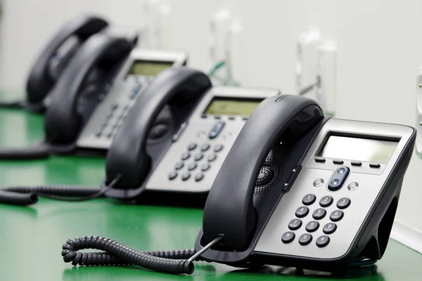 Black phones in call center — Stock Photo, Image