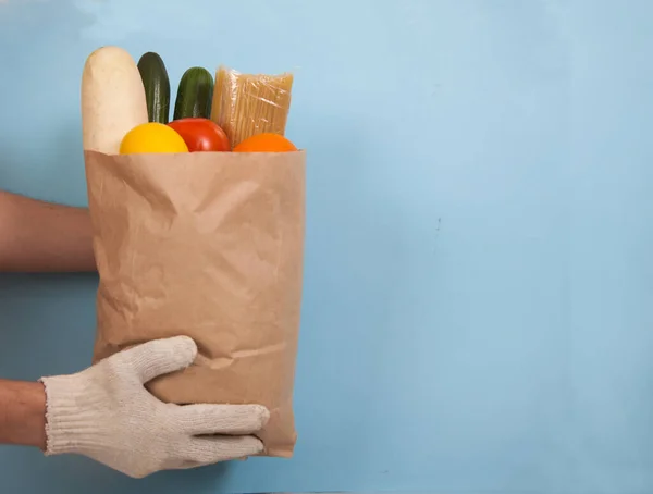Male Hands Cotton Gloves Hold Paper Bag Pasta Tomatoes Cucumbers — Stock Photo, Image