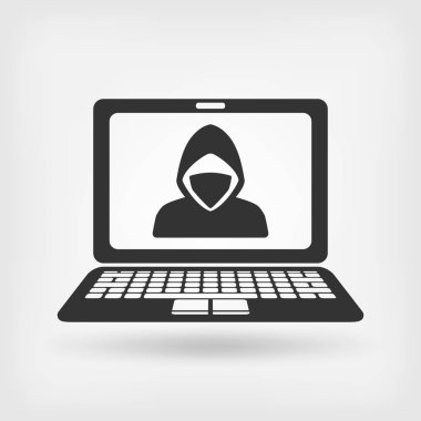 dizüstü bilgisayar ekranında maskeli hacker