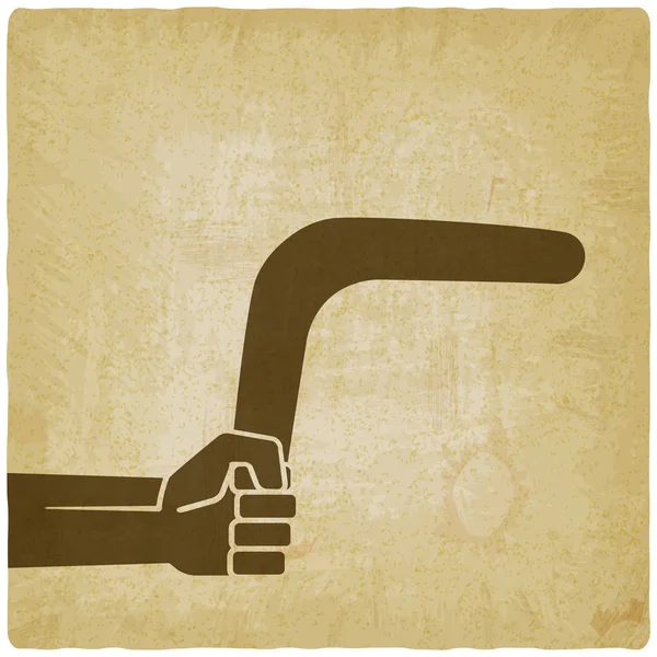 Hand mit Bumerang altem Hintergrund — Stockvektor