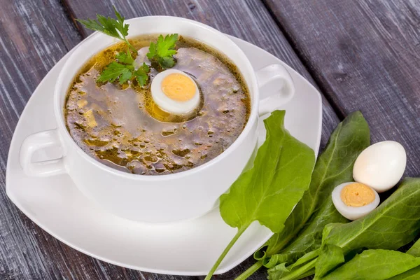 Green soup with sorrel and egg Royalty Free Stock Images