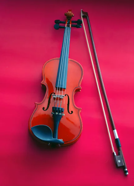 Violin Bow Put Red Background Classic Art Tone — Stock Photo, Image