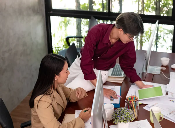 Young business people working ,with colleagues team meeting,busy time,at office,blurry light around