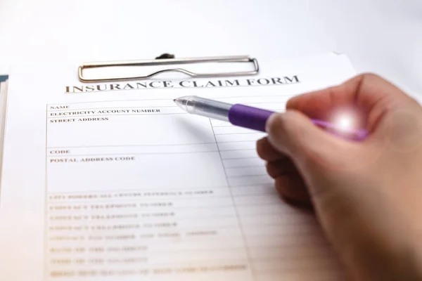 Pen Human Hand Signing Insurance Claim Form Lens Flare Effect — Stock Photo, Image