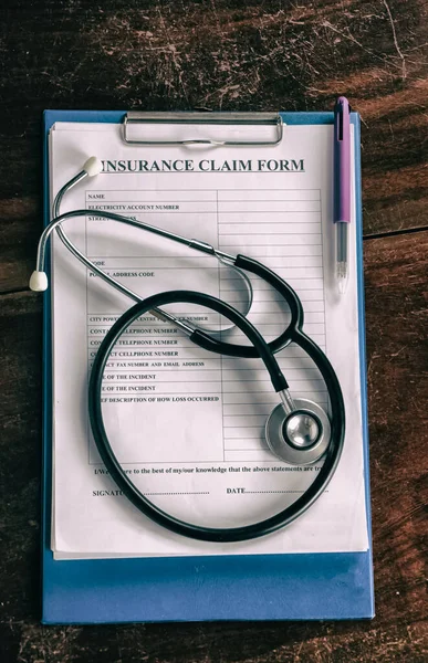 Stethoscope Insurance Claim Form Put Wooden Desk Abstract Art Design — Stock Photo, Image