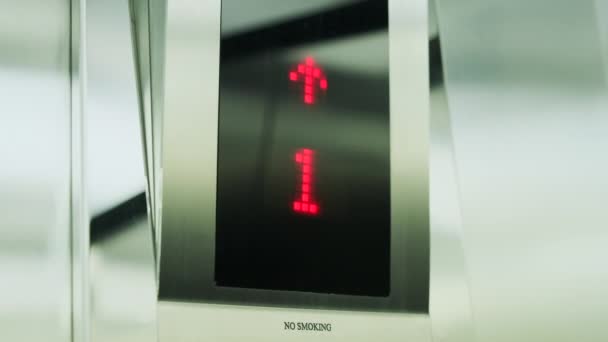 Interior of steel silver elevator which rises up inside of modern business center. Digital display in the elevator showing floor number. Lift go up to eleven floor. Cabin of modern passenger elevator — Vídeo de Stock