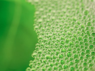 Neon yeşil sıvı pompalar. Soyut arkaplan