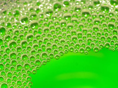 Neon yeşil sıvı pompalar. Soyut arkaplan