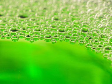 Neon yeşil sıvı pompalar. Soyut arkaplan