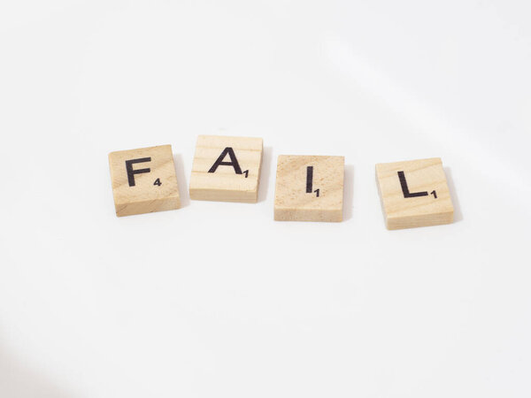 Fail word written with wooden blocks