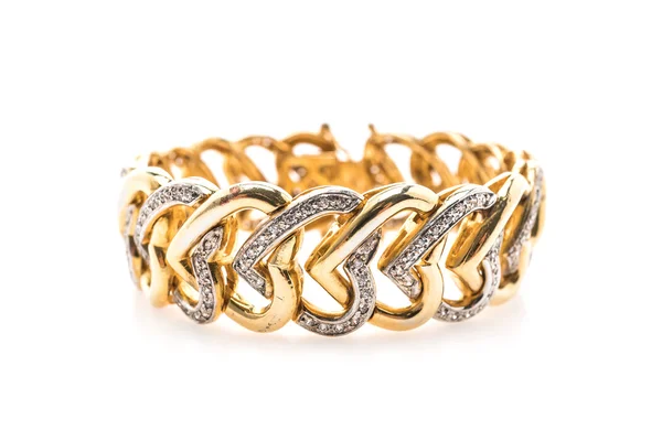 Zlatý náramek a diamantové šperky — Stock fotografie