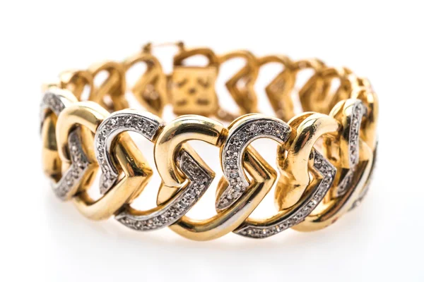 Zlatý náramek a diamantové šperky — Stock fotografie