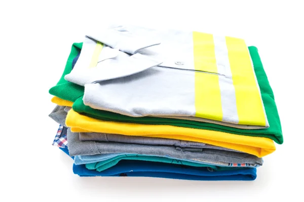 Stack of T shirts and polo shirts — Stock Photo, Image