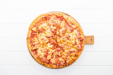 Hawaiian pizza  on cutting board  clipart