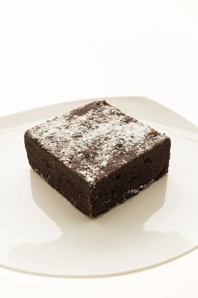 Chocolate brownies in white plate — Stock Photo, Image