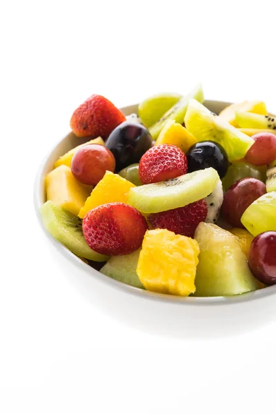 Blandad frukt i vit platta — Stockfoto