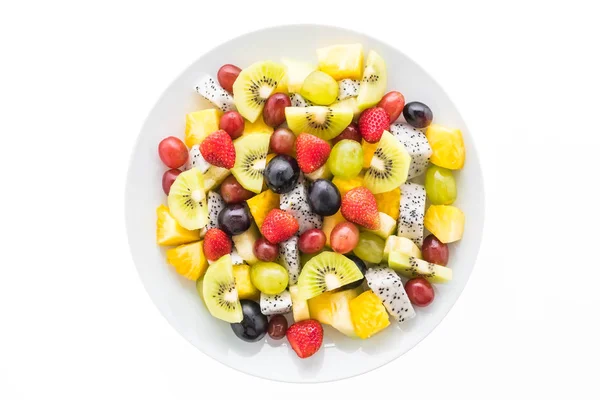 Fruta mixta en plato blanco —  Fotos de Stock