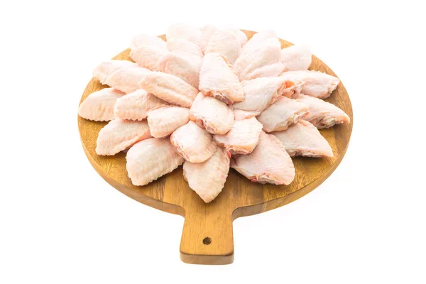Syrové kuřecí maso a křídlo na dřevěném prkénku nebo deska — Stock fotografie