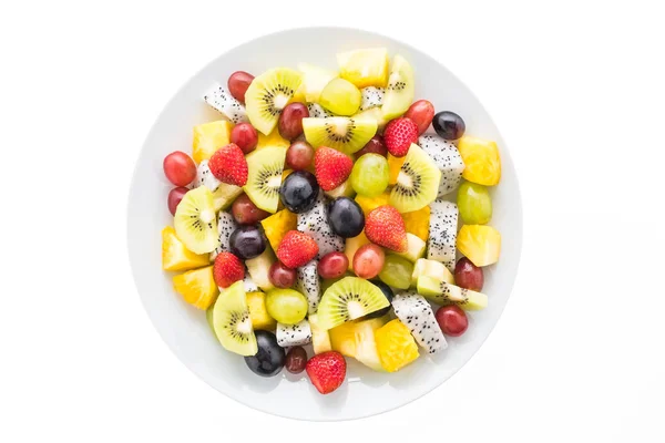 Fruta mixta en plato blanco —  Fotos de Stock