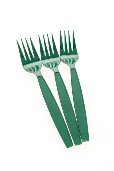 Green plastic forks — Stock Photo, Image