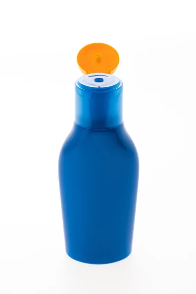 Leere Kosmetikflasche mit Sonnencreme — Stockfoto