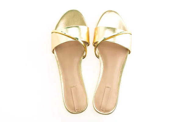 Belle scarpe sandalo oro — Foto Stock