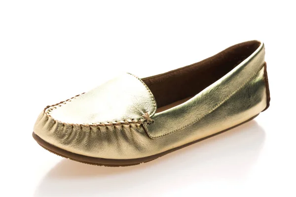 Модные золотые женские туфли — стоковое фото