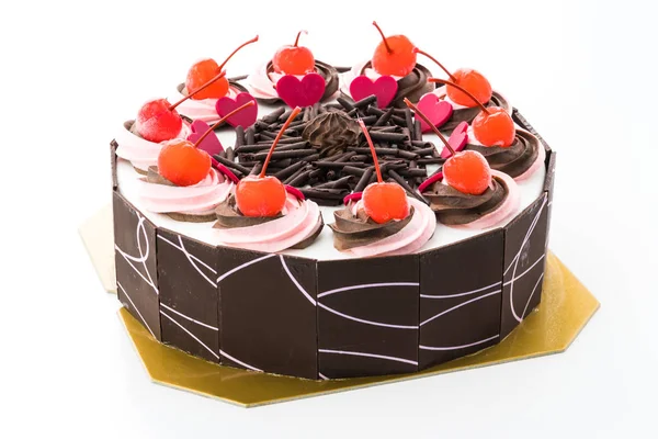 Bolo de chocolate com cereja em cima — Fotografia de Stock