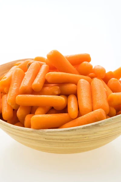 Baby carrot in wooden bowl — Stock Photo, Image