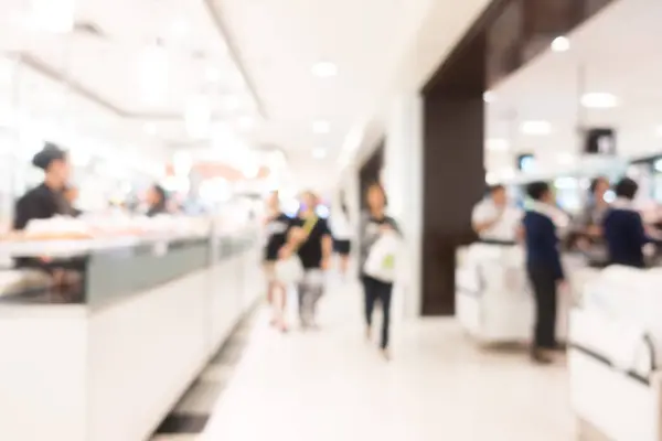 Loja de departamento de borrão abstrato com shopping center — Fotografia de Stock