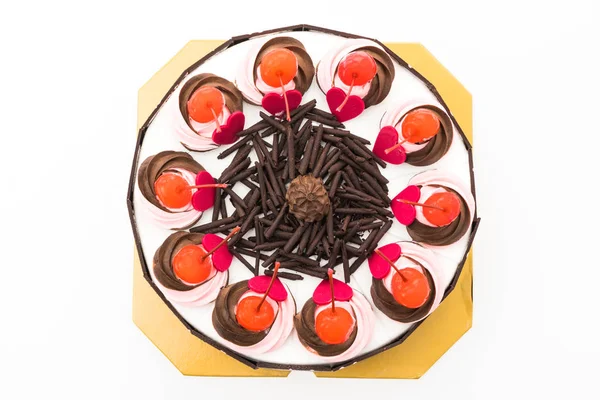 Pastel de chocolate con cereza encima —  Fotos de Stock