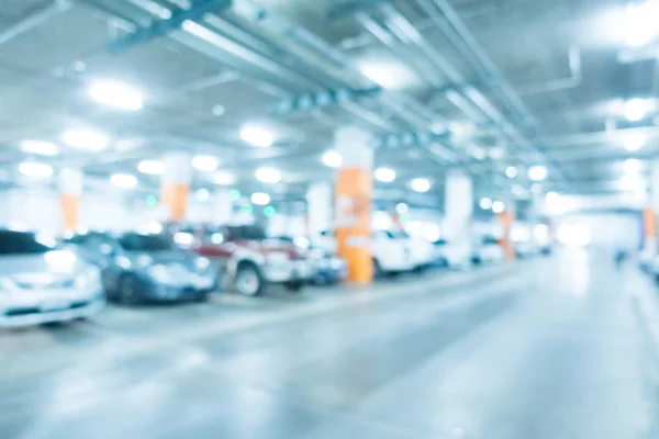 Abstract vervagen parkeren van de auto in winkelcentrum — Stockfoto