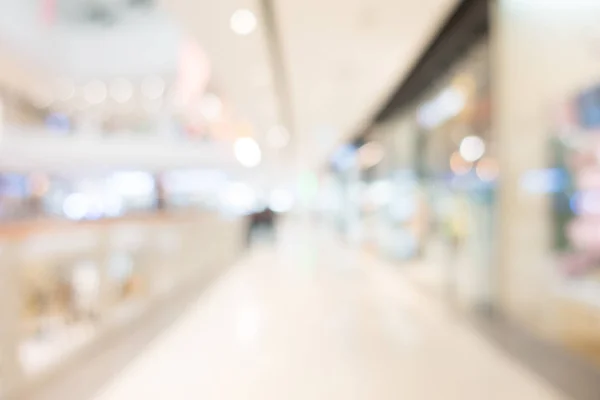 Abstrato borrão e bokeh shopping center e varejo loja — Fotografia de Stock