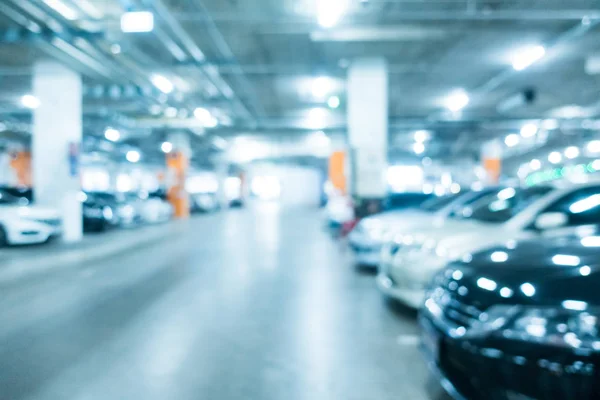 Abstract vervagen parkeren van de auto in winkelcentrum — Stockfoto