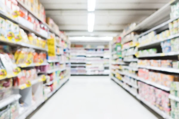 Abstract blur and bokeh supermarket and discount store interior — Stock Photo, Image