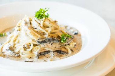 Spaghetti cream sauce with truffle mushroom clipart