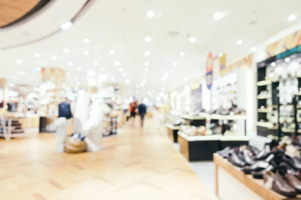 Abstract blur and bokeh defocused shopping mall interior of depa — Stock Photo, Image