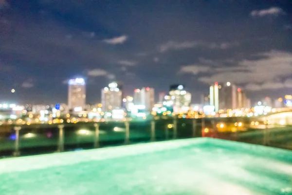 Borrão abstrata e desfocada piscina à noite — Fotografia de Stock