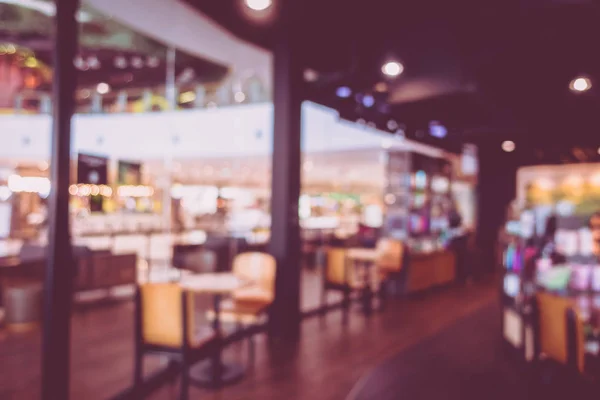 Abstract blur and coffee shop cafe interior for background