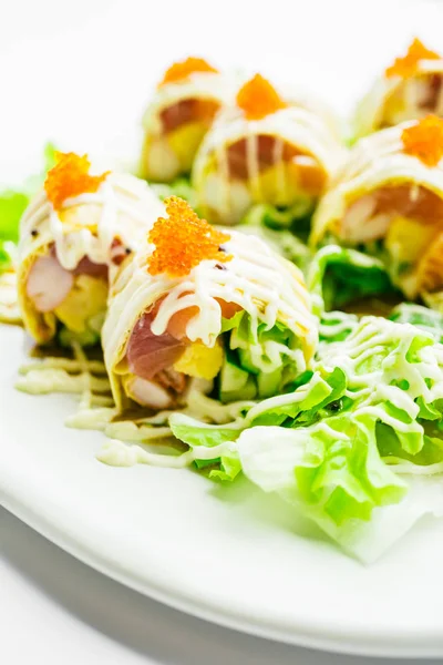 Sushi roll with tuna salmon and sweet egg inside — Stock Photo, Image