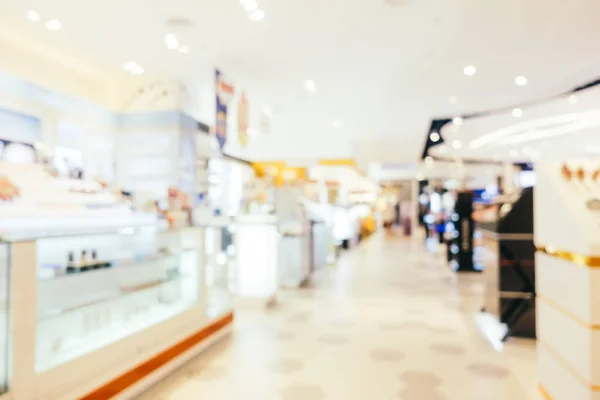 Abstrato borrão e bokeh desfocado shopping center interior de depa — Fotografia de Stock