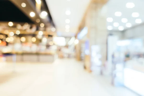 Abstrato borrão e bokeh desfocado shopping center interior de depa — Fotografia de Stock